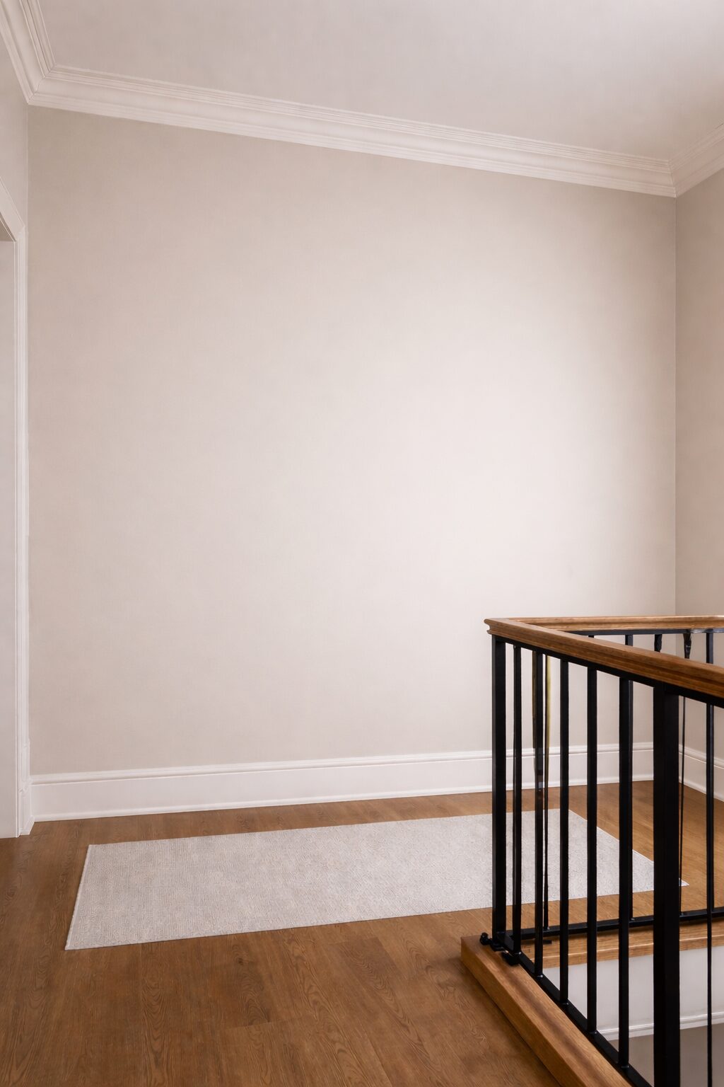 Plain painted landing wall before decorative finish
